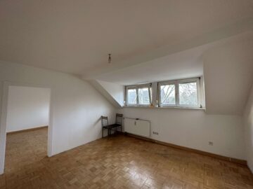 Dachgeschosswohnung in Zentraler Lage - Wohnzimmern